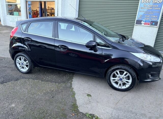 
								2015 FORD FIESTA ZETEC 5 DOOR PETROL IN BLACK £20 ROAD TAX. full									